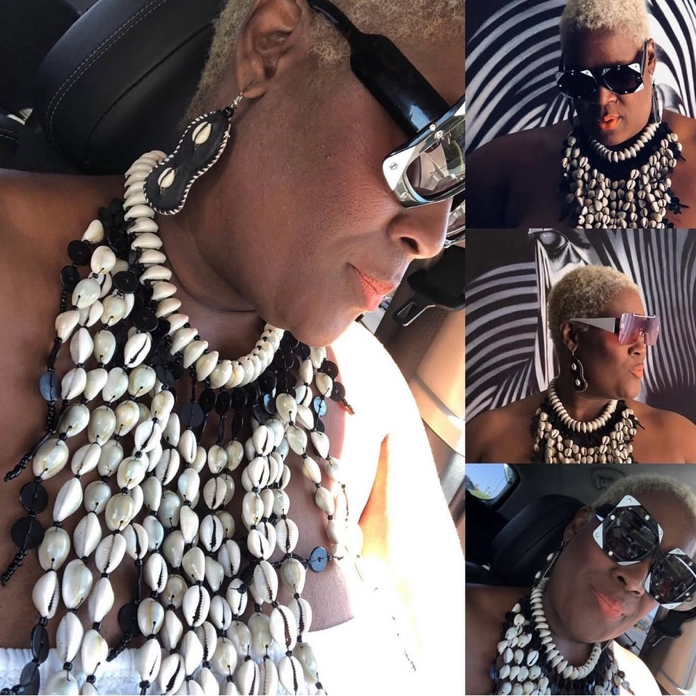 Bold black cowrie shell necklace.